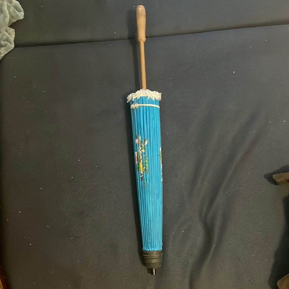 A blue aesthetic umbrella from the renaissance fair.